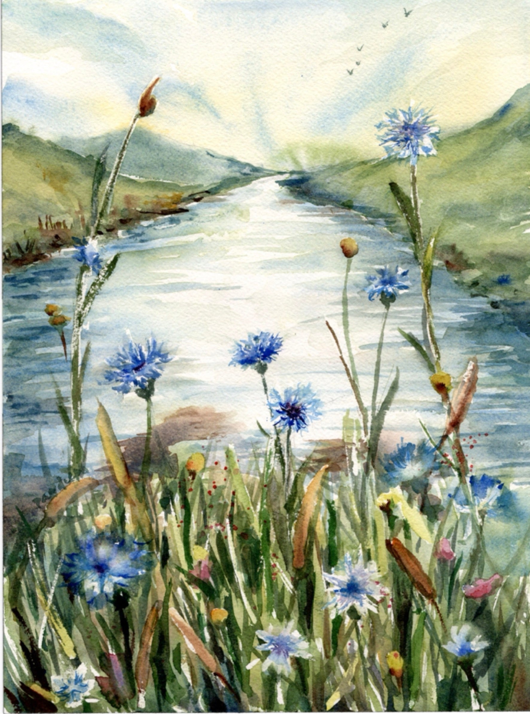 Watercolor landscape painting of a winding river or stream bordered by green hills and blue wildflowers in the foreground.